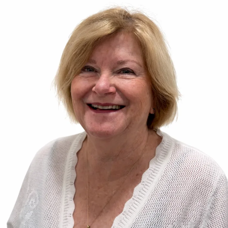 Friendly smile against a white backdrop