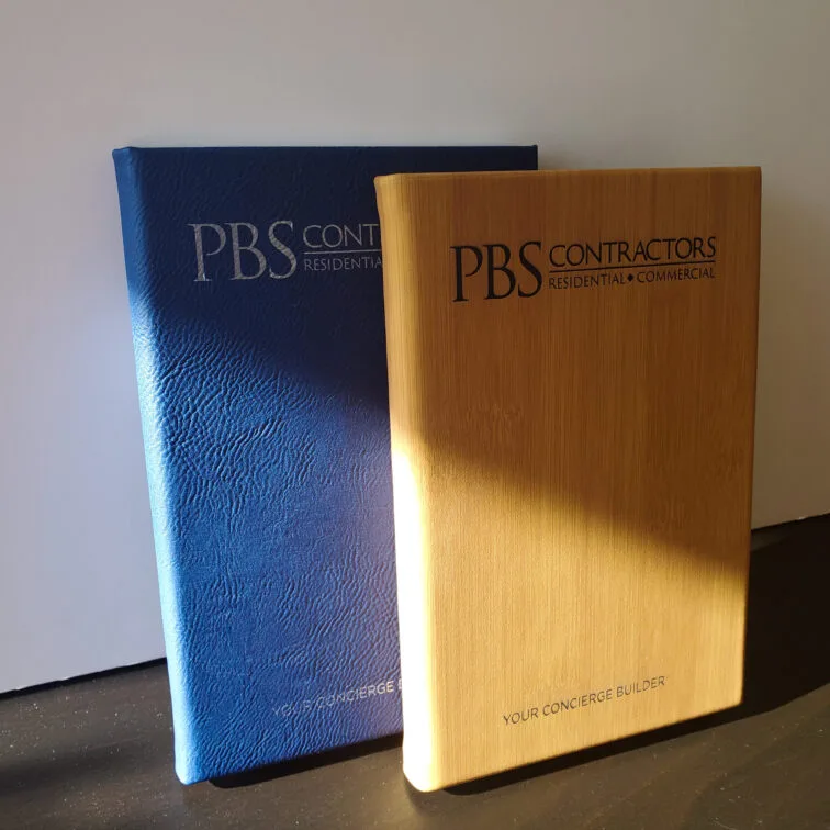 Blue and faux wood journals