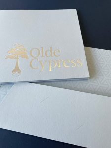 dull-silver-foil-stamped-blue-presentation-folder