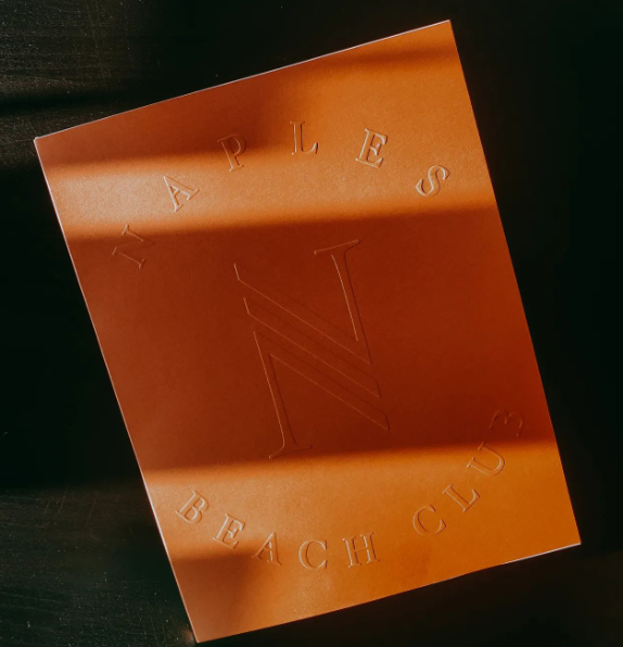 Naples Beach Club embossed cover
