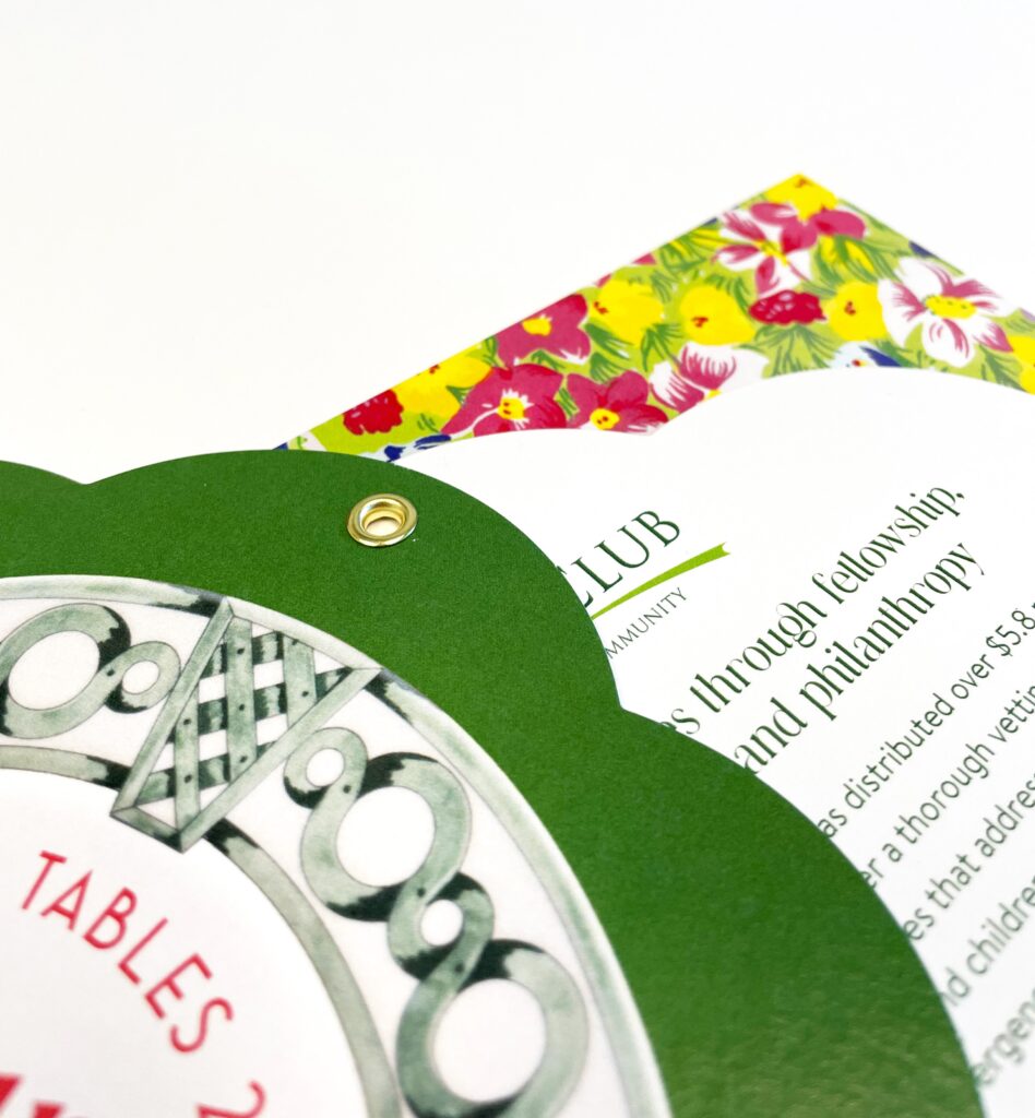 Flower die cut grommet bound invitation