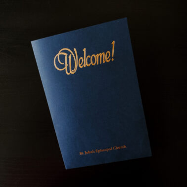 Gold foil stamped embossed navy blue presentation folder
