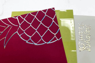 Raised foil holographic gold raised spot varnish